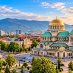 Alexander Nevsky Cathedral and Sofia city skyline with Vitosha Mountain in the background